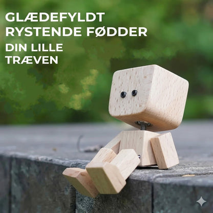 Charmerende lille gyngefigur i træ med 12 magnetiske udtryk