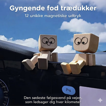 Charmerende lille gyngefigur i træ med 12 magnetiske udtryk
