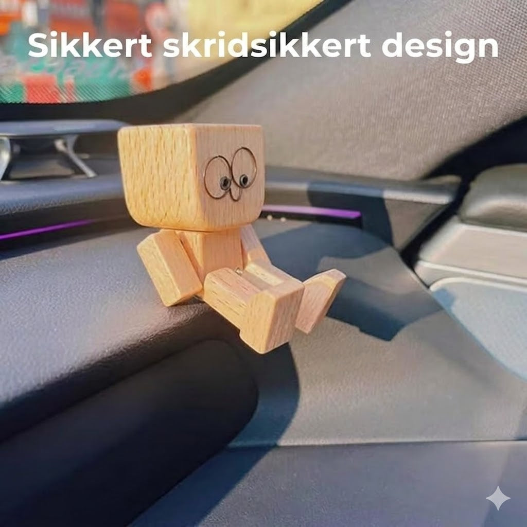 Charmerende lille gyngefigur i træ med 12 magnetiske udtryk